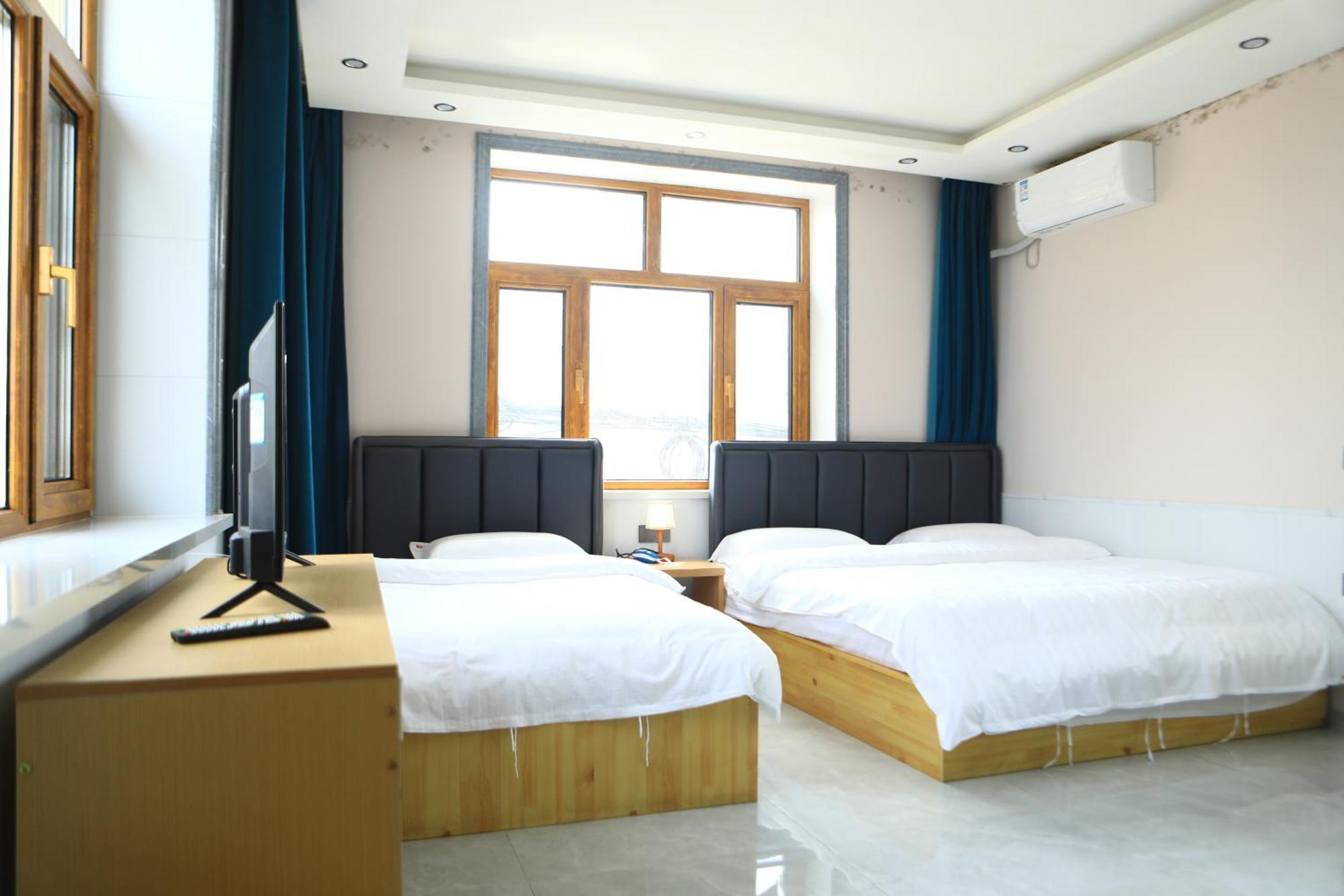 Hongge Hotel - Harbin Taiping Airport מראה חיצוני תמונה
